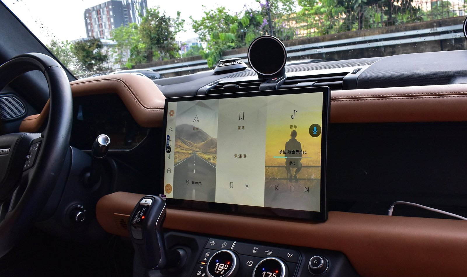 Jaguar Land Rover Android head unit installed in vehicle dashboard